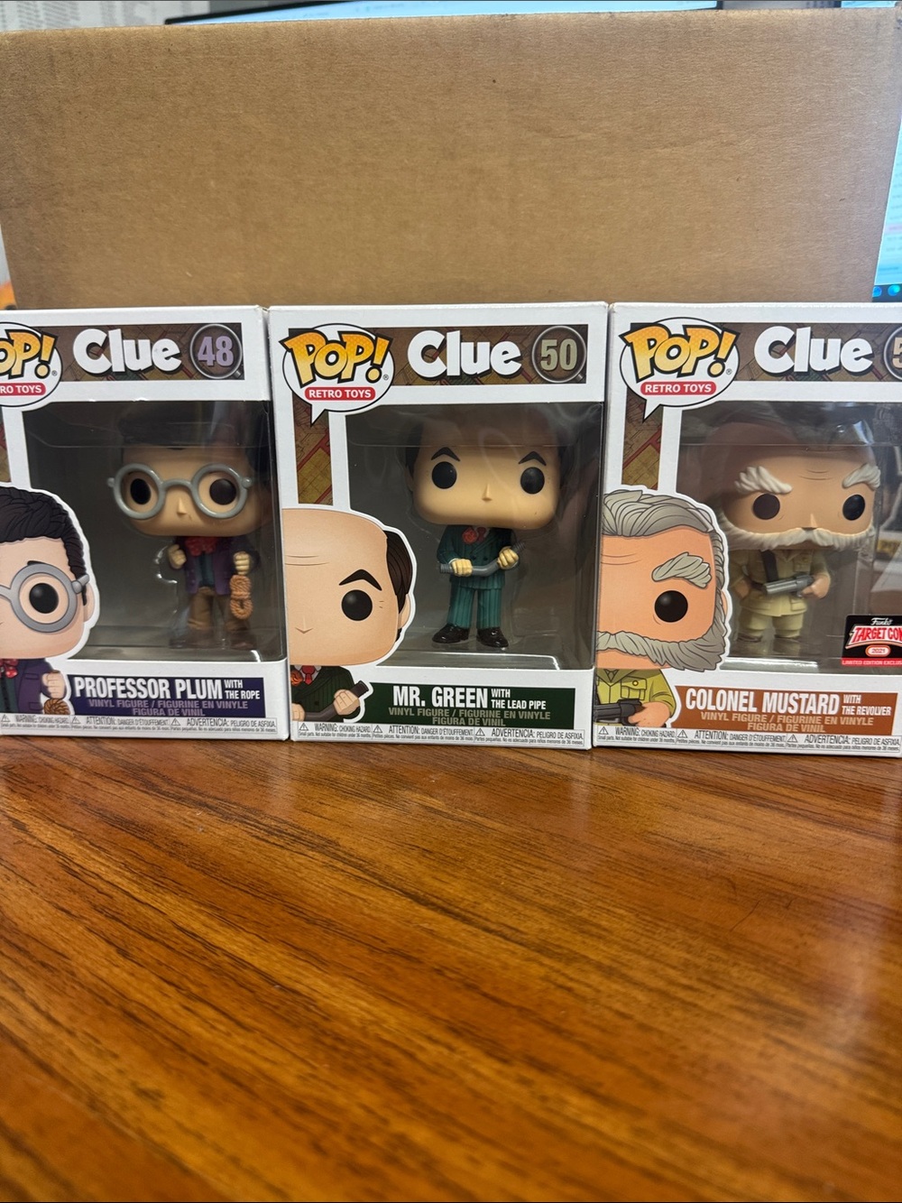 Funko Clue Trio — Plum (purple), Green (green), Mustard (tan)